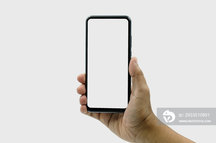 Hand holding, New version of black slim smartphone similar to iphone x with blank white screen from Apple generation 10 , Front mockup model similar to iPhonex , Background of digital economy.