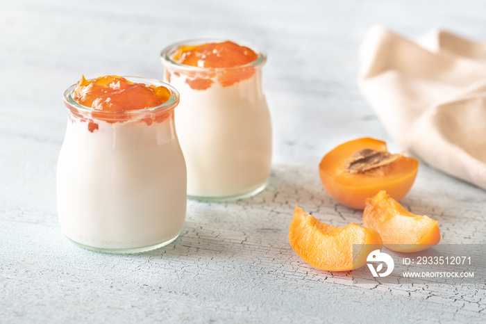 Two jars of Greek yogurt with apricot