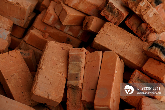 pile of brick block used for industrial in residential building construction site, image for industry background. Solid clay bricks for construction. Brick. Close-up.