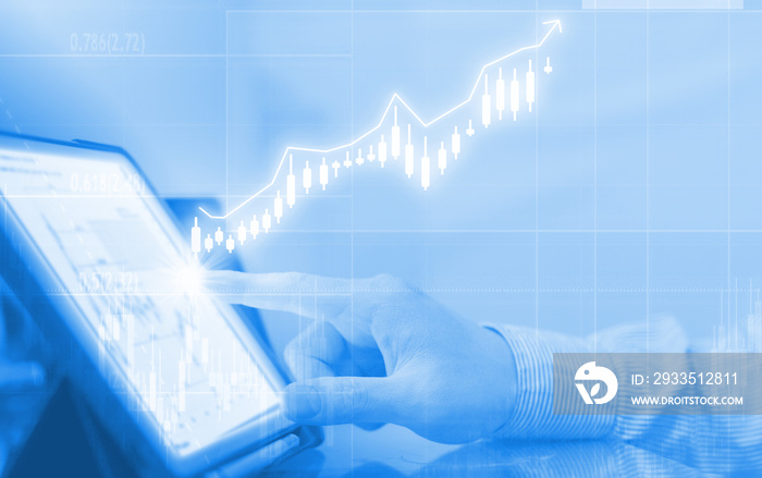 market volatility computer diagram graph with business man hand type