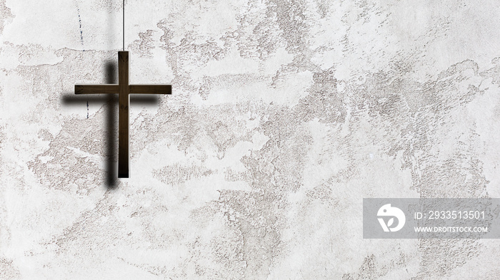 Christian wooden cross on the white and grey wall with the lighting.