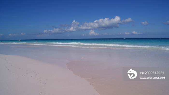 Beautiful view of the pink sands beach with turquoise crystal clear water in Harbour Island, Bahamas