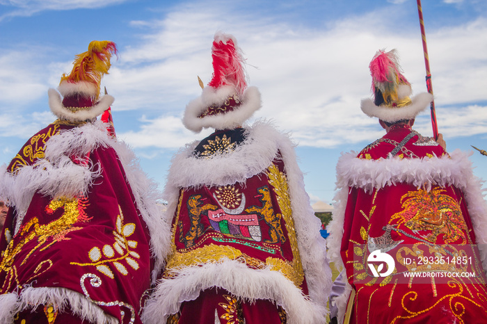 Three knights on their horses with costumes during a folklore celebration at Pirenopolis, Brazil