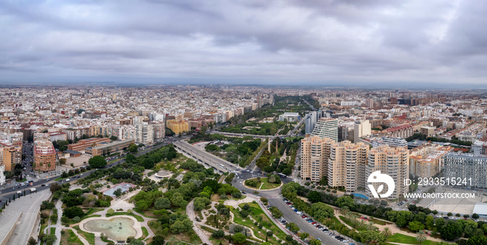 Aerial drone view of sunrise over Turia Gardens, a riverbed turned into a park, in Valencia, Spain