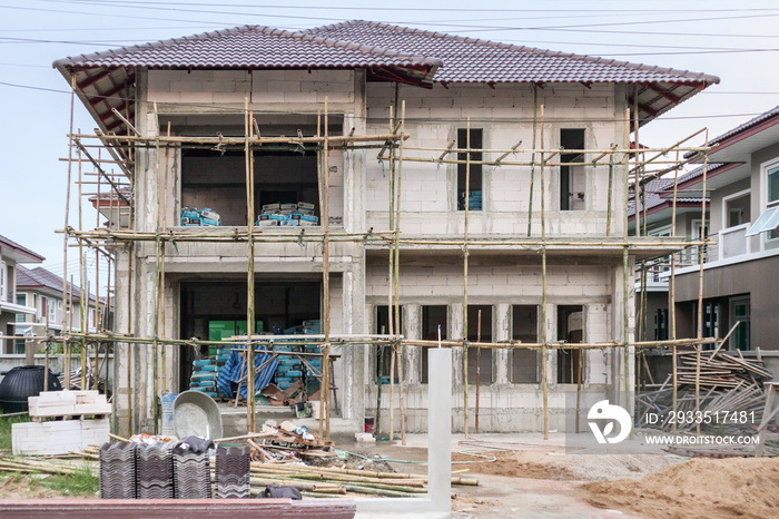 New residential house contemporary style building in progress at construction site