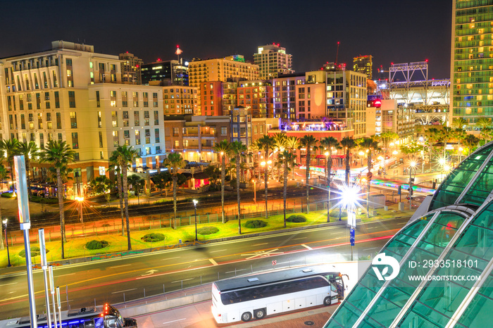 Aerial view of San Diego Downtown skyline and Harbor Drive from the Convention Center. Night urban scene. San Diego Gaslamp Quarter, California, USA.