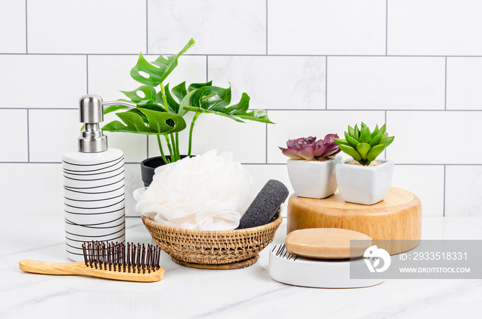 Herb soap, shower sponge inside a bright bathroom background.