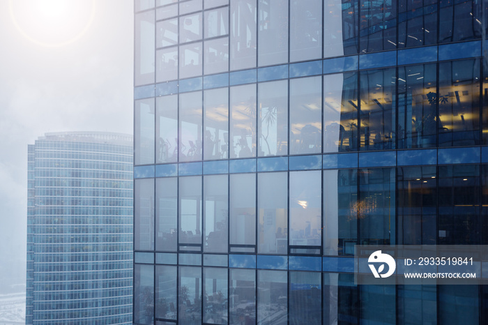 Facade Of An Office Building With The Reflection In The Windows.