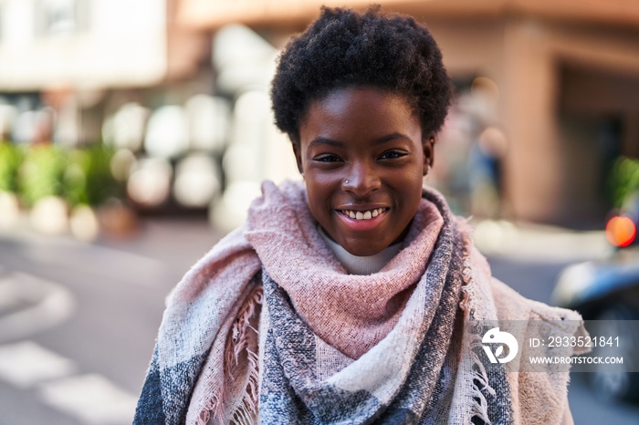 African american woman smiling confident standing at street