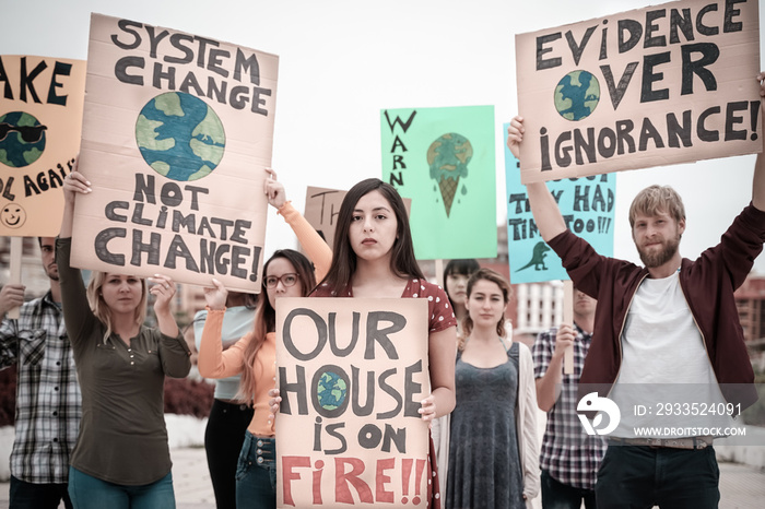 People protesting against multicultural opinion. Young people from different countries showing their ideology. Young together under same defense - Image