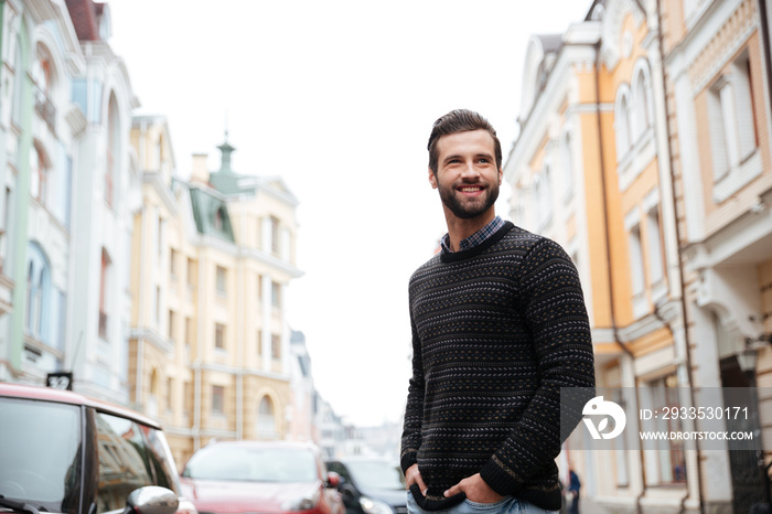 Portrait of a happy bearded man in sweater