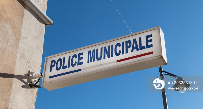 Police Municipale (municipal police) sign on the storefront of a local police station