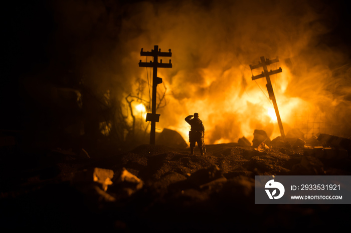 War Concept. Military silhouettes fighting scene on war fog sky background, World War Soldiers Silhouette Below Cloudy Skyline At night. Battle in ruined city. Selective focus