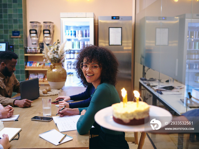 UK, London, Coworkers celebrating birthday in office