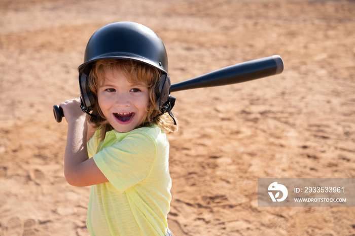 Child baseball player focused ready to bat. Kid holding a baseball bat.