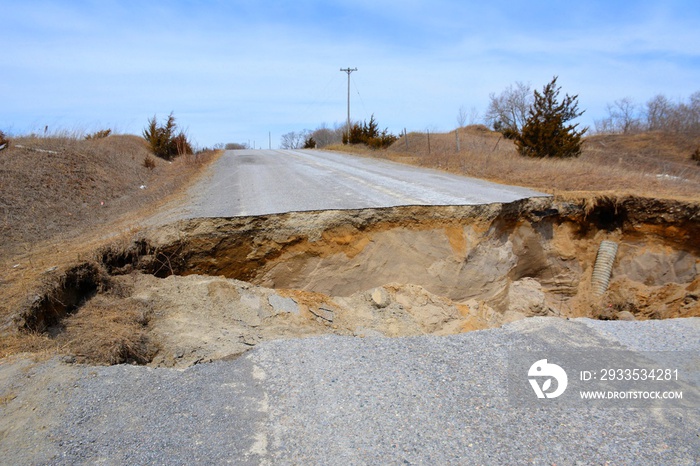 A large sink hole destroys a entire road