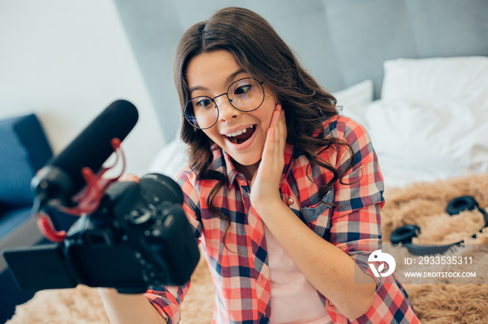 Talking on the camera may seem exciting for the teenagers