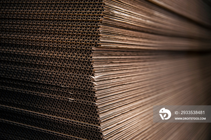 Polygraphic production, sheets of corrugated cardboard are stacked