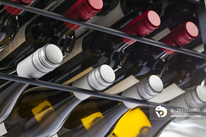 Quality wine bottles with screw caps in a wine rack