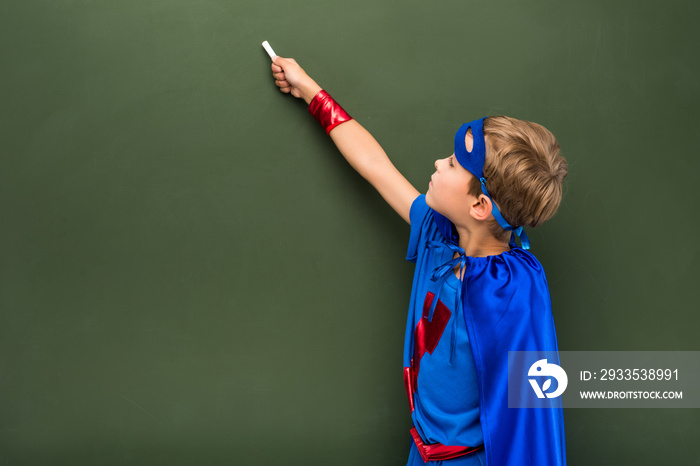 Schoolchild in superhero costume