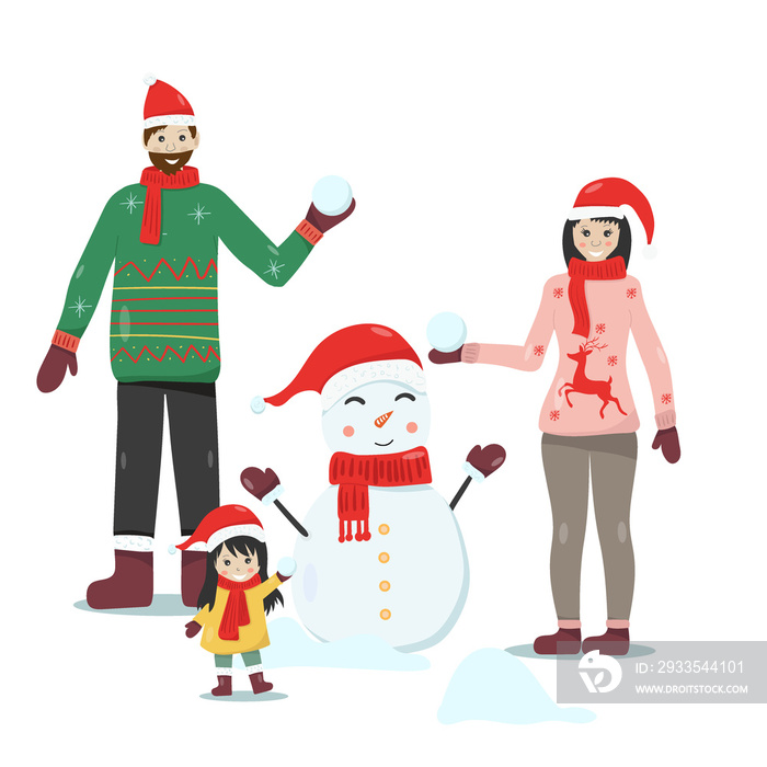 Happy family making a snowman