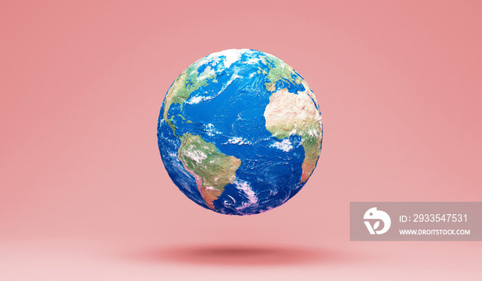 Miniature Earth Planet on pink studio background