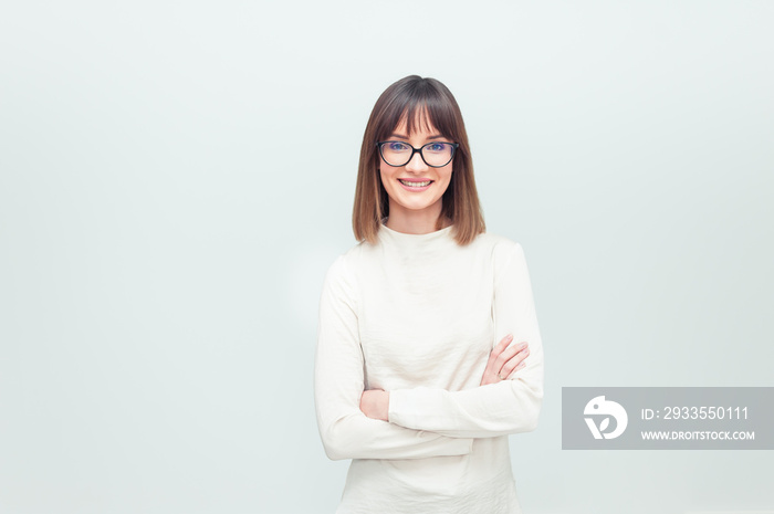 Portrait of beautiful woman in eyeglasses in office company