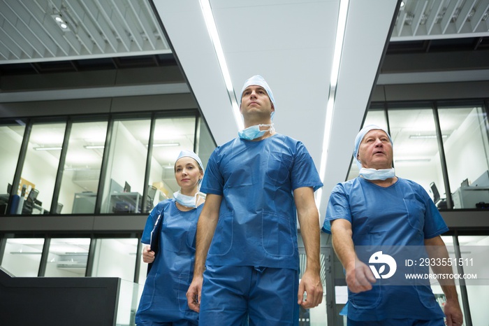 Surgeons walking in hospital