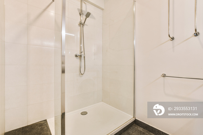 Modern shower stall in a bright bathroom