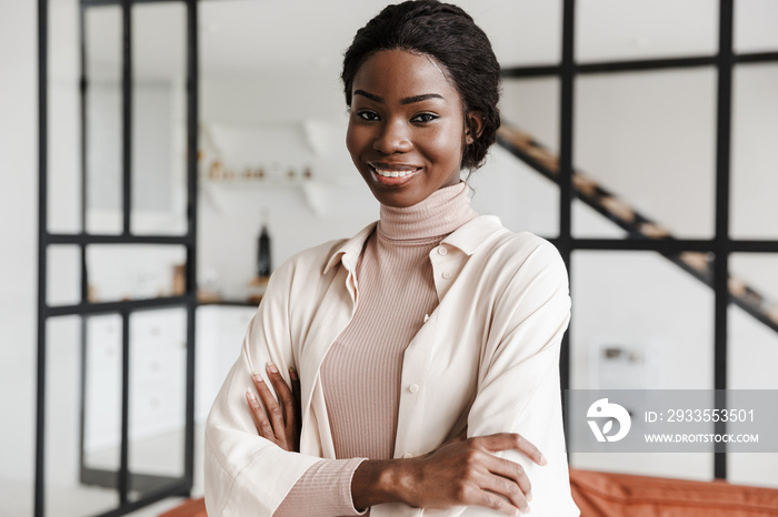 Happy cheerful optimistic young african woman