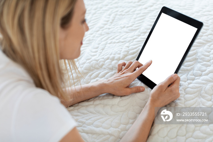 Female holding modern digital tablet with empty screen, mockup