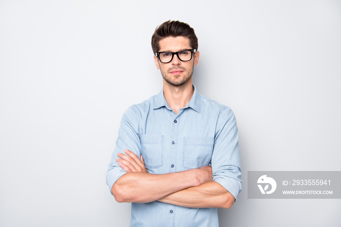 Photo of serious confident business coach standing with arms crossed with bristle on his face staring at you isolated over grey color background