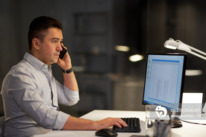 business, deadline and technology concept - businessman with computer calling on sartphone at night office