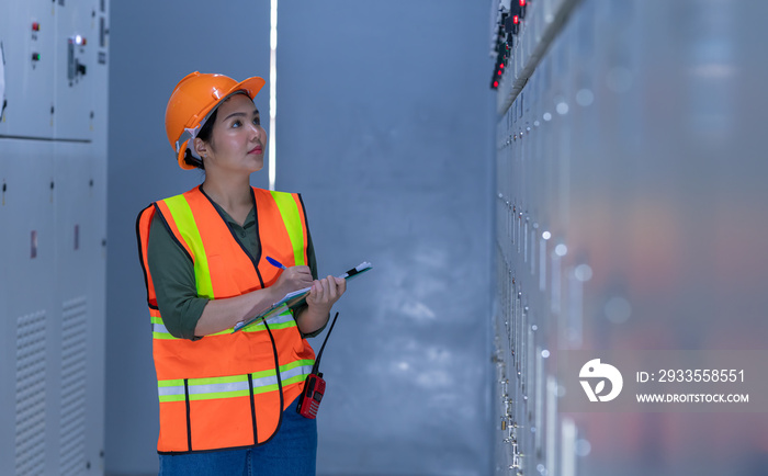 Engineer checking and inspecting at MDB panel , working with electric switchboard to check medium Voltage Switchgear working in Main Distribution Boards factory.