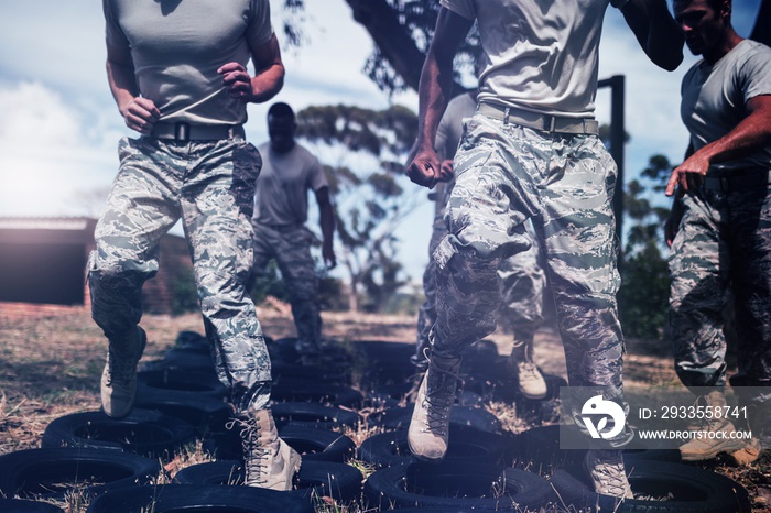 Trainer giving training to military soldiers