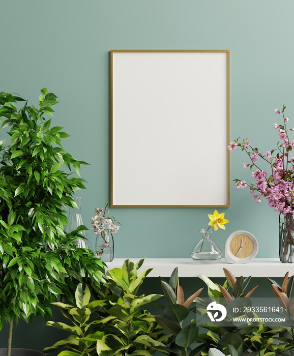 Mock up gold photo frame on the white shelf with beautiful plants.
