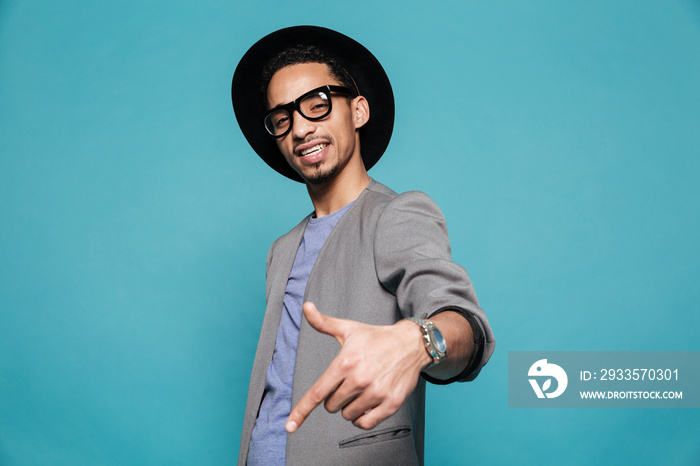 Portrait of an afro american man in eyeglasses and hat