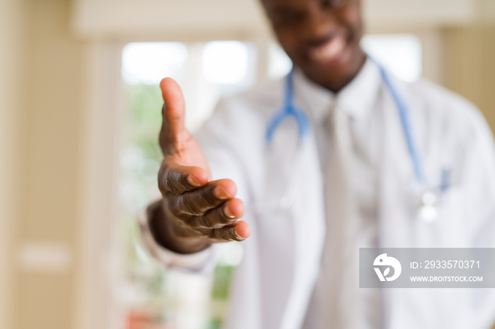 Close up of african doctor offering hand for welcome hand shake and smiling