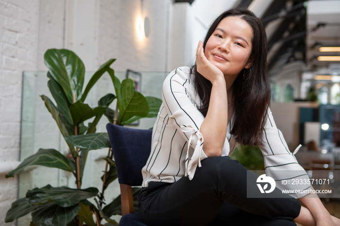 Portrait of smiling woman at home