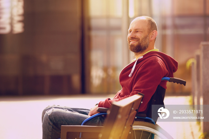 happy man on wheelchair