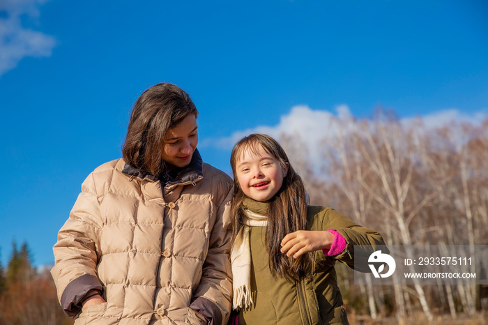 Portrait of the girls smiling in the park