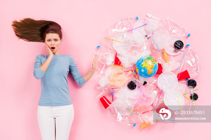 Top above high angle view photo impressed eco voluntary girl gesture hand ask stop pollute globe trash cup glass plate bottle bags touch hands face flay lay isolated pastel color background