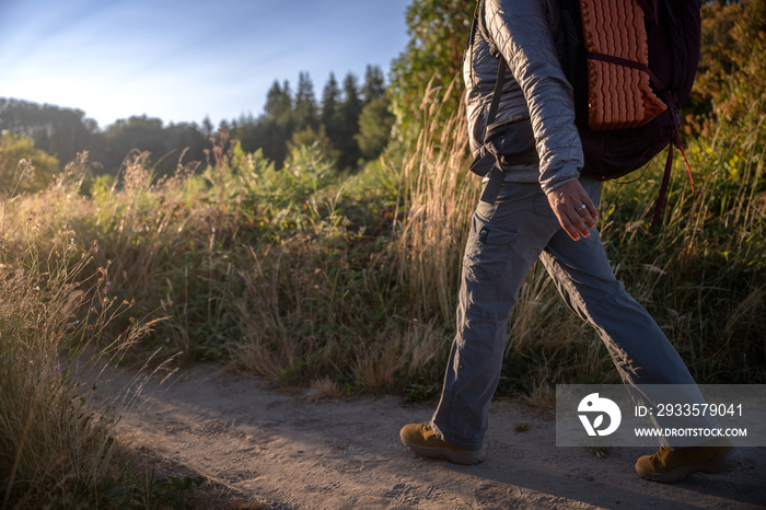 U.S. Army female soldier putting in the miles with an early morning hike in the NorthWest.