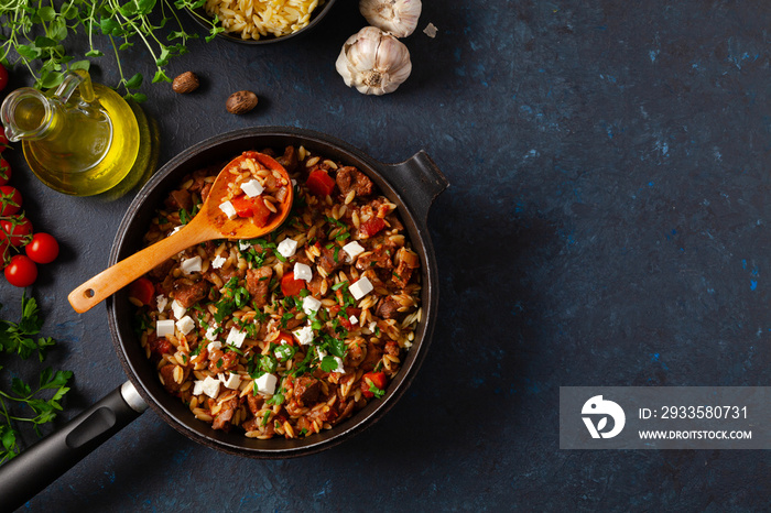 Traditional Greek cuisine. Lamb stew with feta cheese and vegetables.