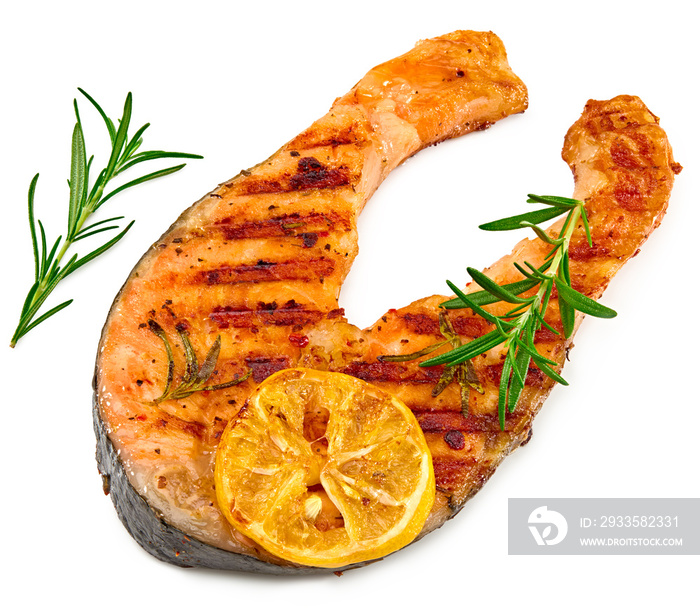 slice of grilled fish, salmon, trout, steak with rosemary on black plate isolated on white background, clipping path