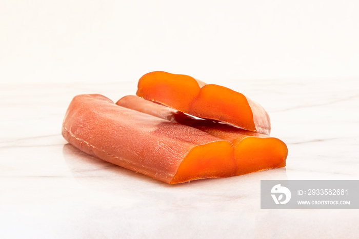 Close-up of a cut bottarga, dried mullet fish roe