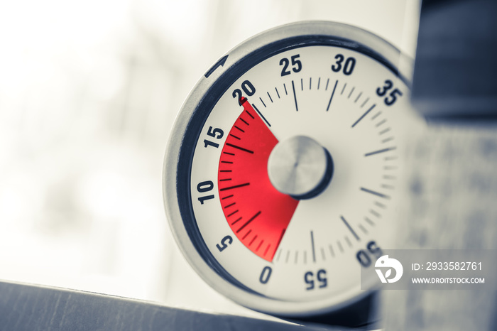 20 Minutes - Analog Kitchen Timer With Red Mark Placed On A Shelf In Monochrome Colors