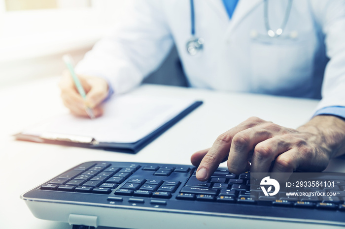 doctor working on computer in clinic office