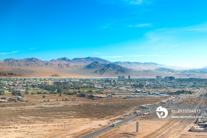 Aerial view of the mining city of Calama in northern Chile with Chuquicamata copper mine in the back.