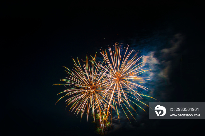 celebration happy new year and merry christmas firework isolated on black isolated background